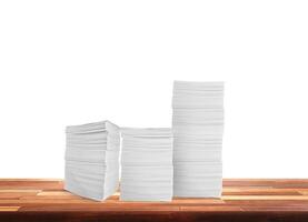 Stack of paper documents on the table Document work in the office Isolated pile on white background. photo