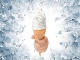 Soft ice cream in hand on background of broken ice photo