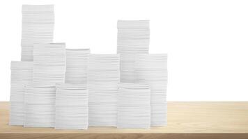 Stack of paper documents on the table Document work in the office Isolated pile on white background. photo