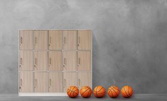 Lockers in the gym with basketballs on the cement floor photo