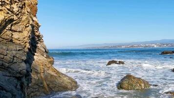 Beautiful rocks cliffs view waves at beach coast panorama Mexico. video