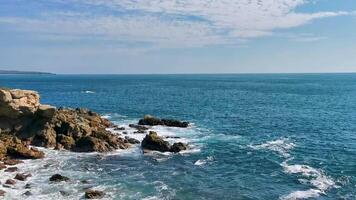 Beautiful rocks cliffs view waves at beach coast panorama Mexico. video