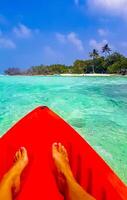 Canoe tour boat in tropical island nature Rasdhoo island Maldives. photo