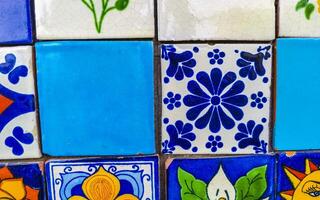 Beautiful colorful tiles with pictures in Puerto Escondido Mexico. photo