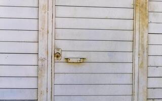 Metal gate door fence texture pattern in Mexico. photo