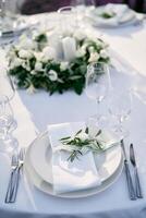 Festive set table with invitations on plates photo