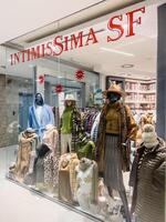 Belgrade, Serbia - 13 august 2023. Showcase with women outerwear on mannequins. Caption. Intimissima SF photo