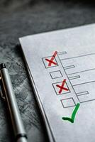 AI generated A checklist with a green check mark and red crosses photo