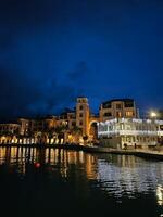 Night embankment of the resort town by the sea photo