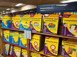 Herceg-Novi, Montenegro - 17 august 2023. Children educational books on grammar, punctuation and math are on store shelves photo