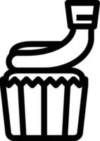 a black and white image of a cupcake vector