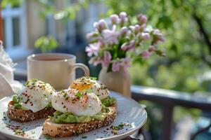 AI generated A set of poached eggs on avocado toast with a side of tea on a sunny balcony. Generative AI. photo