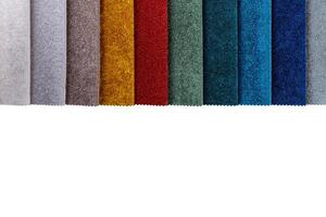 Multi colored set of upholstery fabric samples for selection, collection of textile swatches photo
