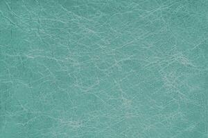 Genuine turquoise leather, eco friendly coarse textured leatherette background photo