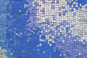 Abstract mosaic ceramic tile background, pattern of blue and white tiles, wall decor photo