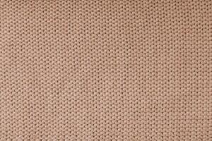 Knitted background, brown jersey  viscose fabric texture photo