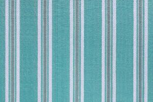 Natural turquoise linen texture with striped pattern as background, wallpaper photo