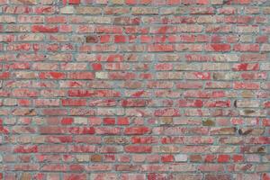 Old red painted brick wall texture background photo