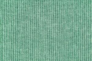 Natural green linen texture with striped pattern as background, wallpaper photo