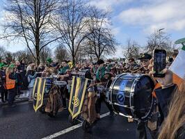 Galway, Ireland  03.17.2024 Saint Patrick's Day parade passing trough Galway city in Ireland photo