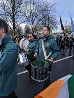 Galway, Ireland  03.17.2024 Saint Patrick's Day parade passing trough Galway city in Ireland photo