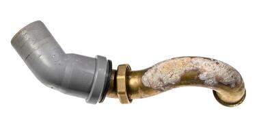 brass bathtub sewer pipe covered with corrosion photo