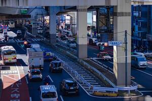 A traffic jam at the city street in Tokyo telephoto shot photo