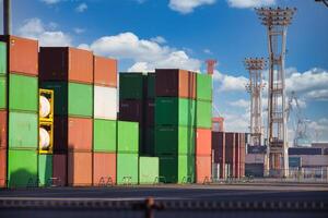 Containers and cranes near the port in Aomi Tokyo telephoto shot photo