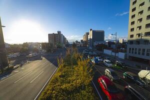 A traffic jam at the large avenue in Kyoto wide shot photo