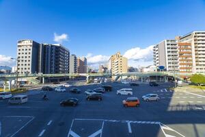 A traffic jam at the large crossing in Kyoto wide shot photo