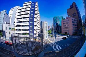 A traffic jam at the city street in Tokyo fish-eye shot photo