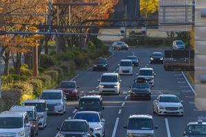 A traffic jam at the large avenue in Kyoto telephoto shot photo