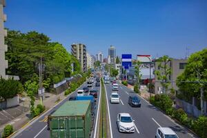 A traffic jam at the urban street in Tokyo wide shot photo