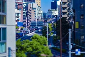 A miniature traffic jam at the city street in Tokyo tiltshift photo