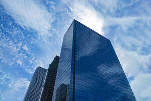 A cloud reflecting the building in the business town wide shot photo