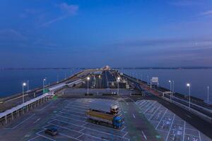 A dusk traffic jam on the highway at Tokyo bay area in Chiba wide shot photo