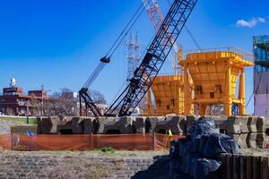 Crane at the under construction telephoto shot photo