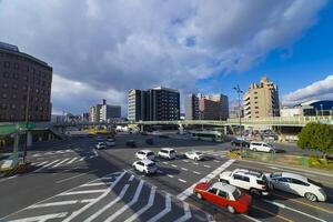 A traffic jam at the large crossing in Kyoto wide shot photo