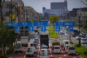 A traffic jam at the urban street in Tokyo long shot photo
