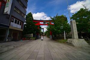 Main gate Torii at Tomioka Shrine wide shot photo