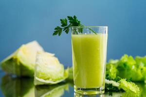 vegetarian smoothie made from green vegetables, cabbage, lettuce, greens photo