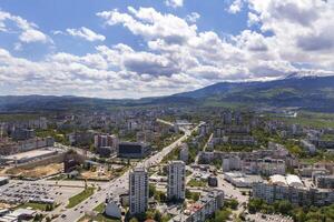 Aerial view from a drone of a city next to the mountain, Sofia Bulgaria photo