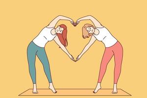 Paired yoga of two women doing pilates, standing on sports mat and making heart sign from hands vector