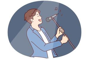 Man pop star sings song leaning back with microphone on tripod in hands vector