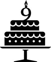 A black-and-white image of a cake with the number 9 on it. vector