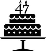 A black-and-white image of a cake with the number 47 on it. vector