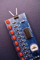 A printed circuit board with radio elements. LEDs and chips. A set for soldering an amateur radio. photo