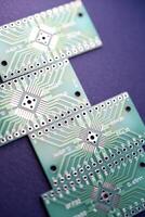 Green printed circuit boards for soldering radio components.  A set for a beginner amateur radio operator. photo
