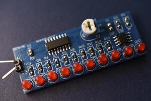 A printed circuit board with radio elements. LEDs and chips. A set for soldering an amateur radio. photo