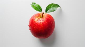 ai generado Fresco rojo manzana con agua gotas en blanco antecedentes foto